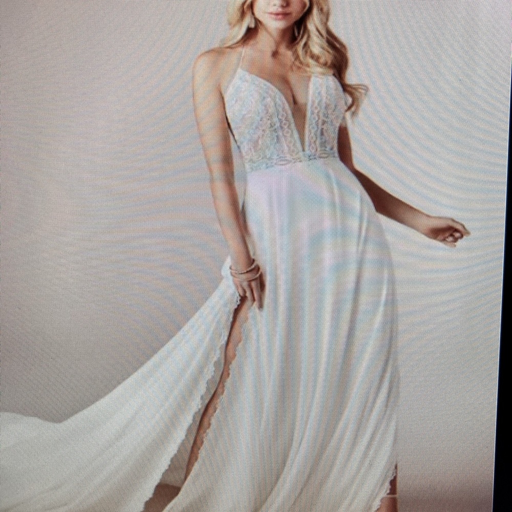 Maggie Sottero “Nicole” side slit wedding dress. Size 8, fits like a size 4-6.
